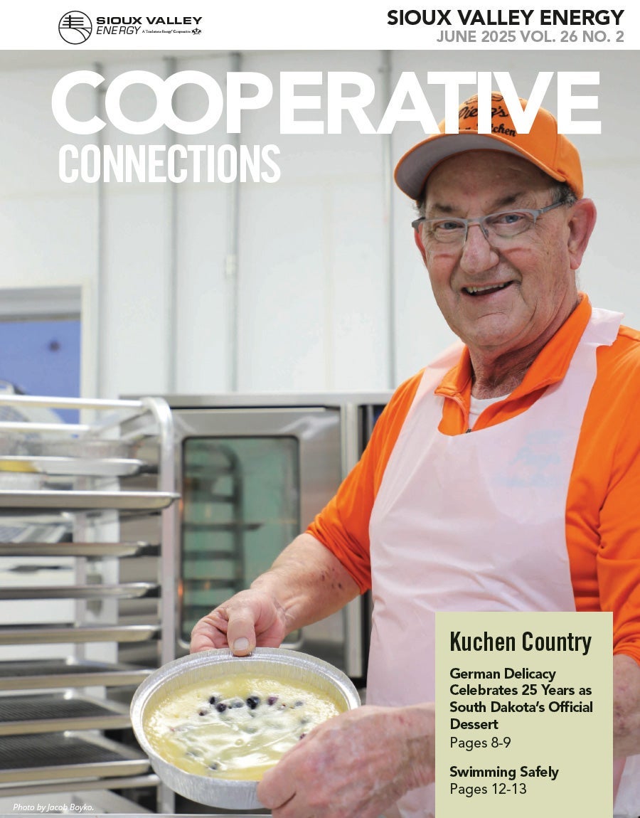 Magazine cover showing man holding a pan of kuchen