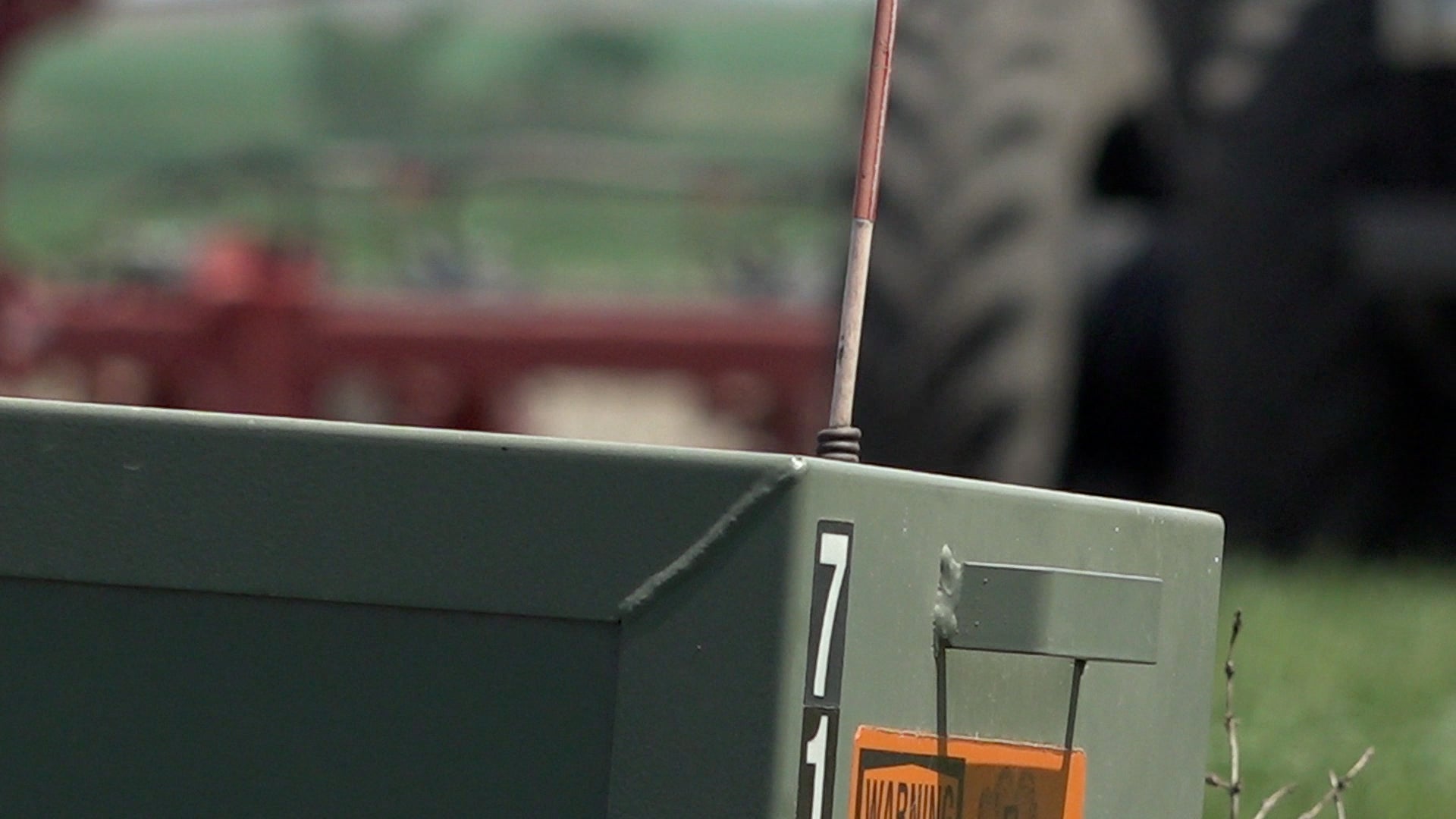 Green box by farm field