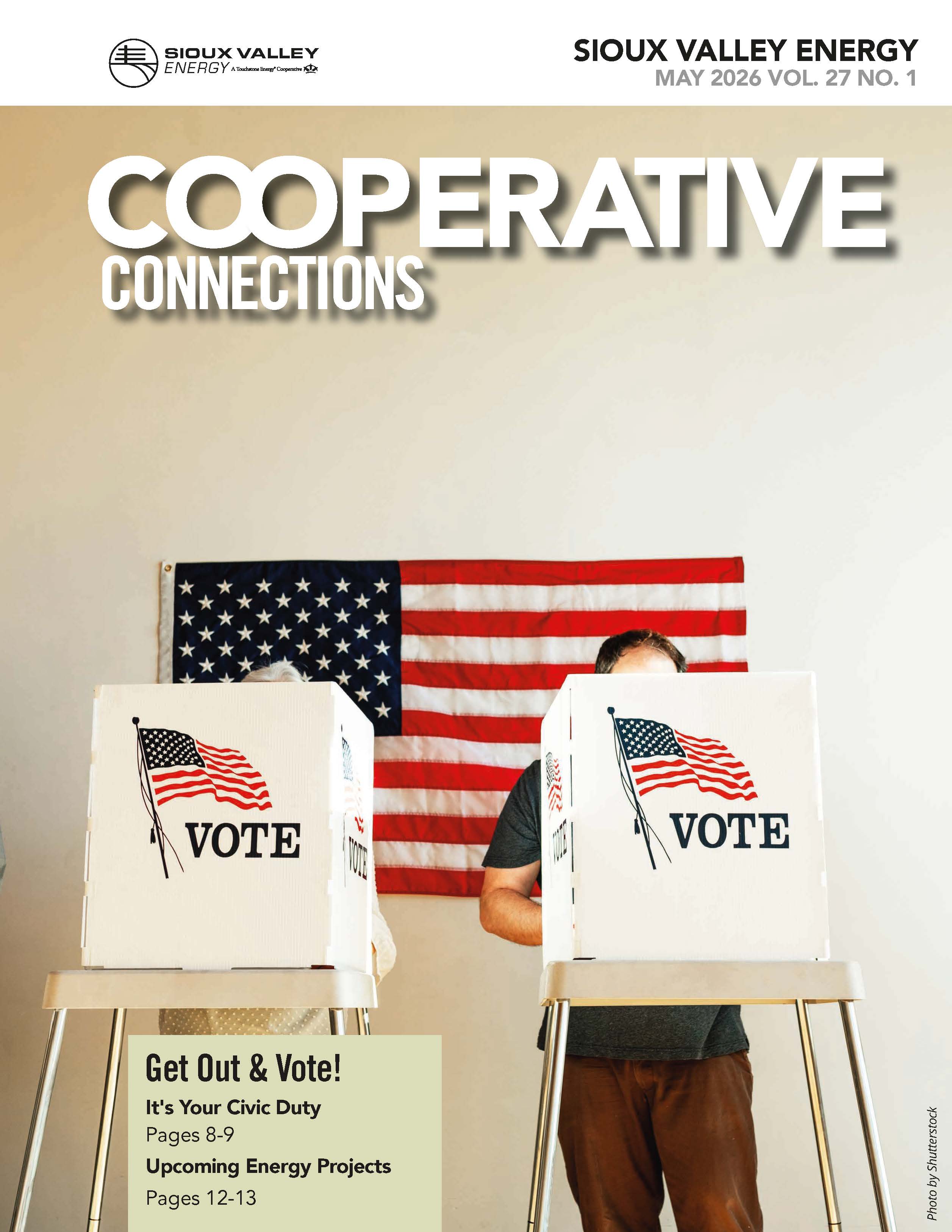 Cover of May 2026 Magazine cover featuring people voting