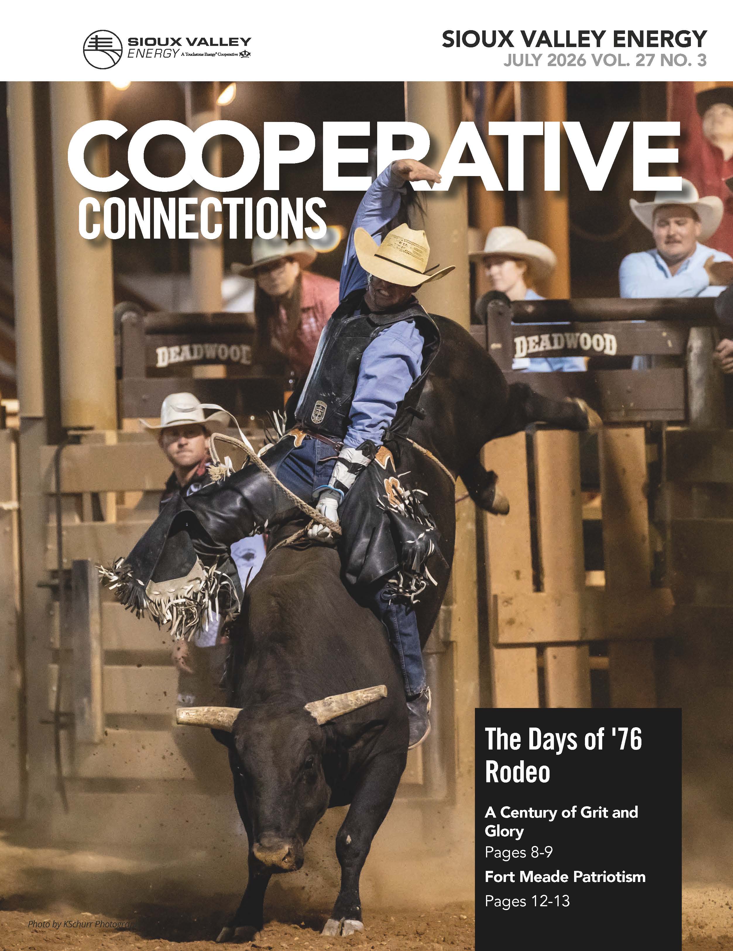 Magazine cover featuring a cowboy riding a bull at a rodeo