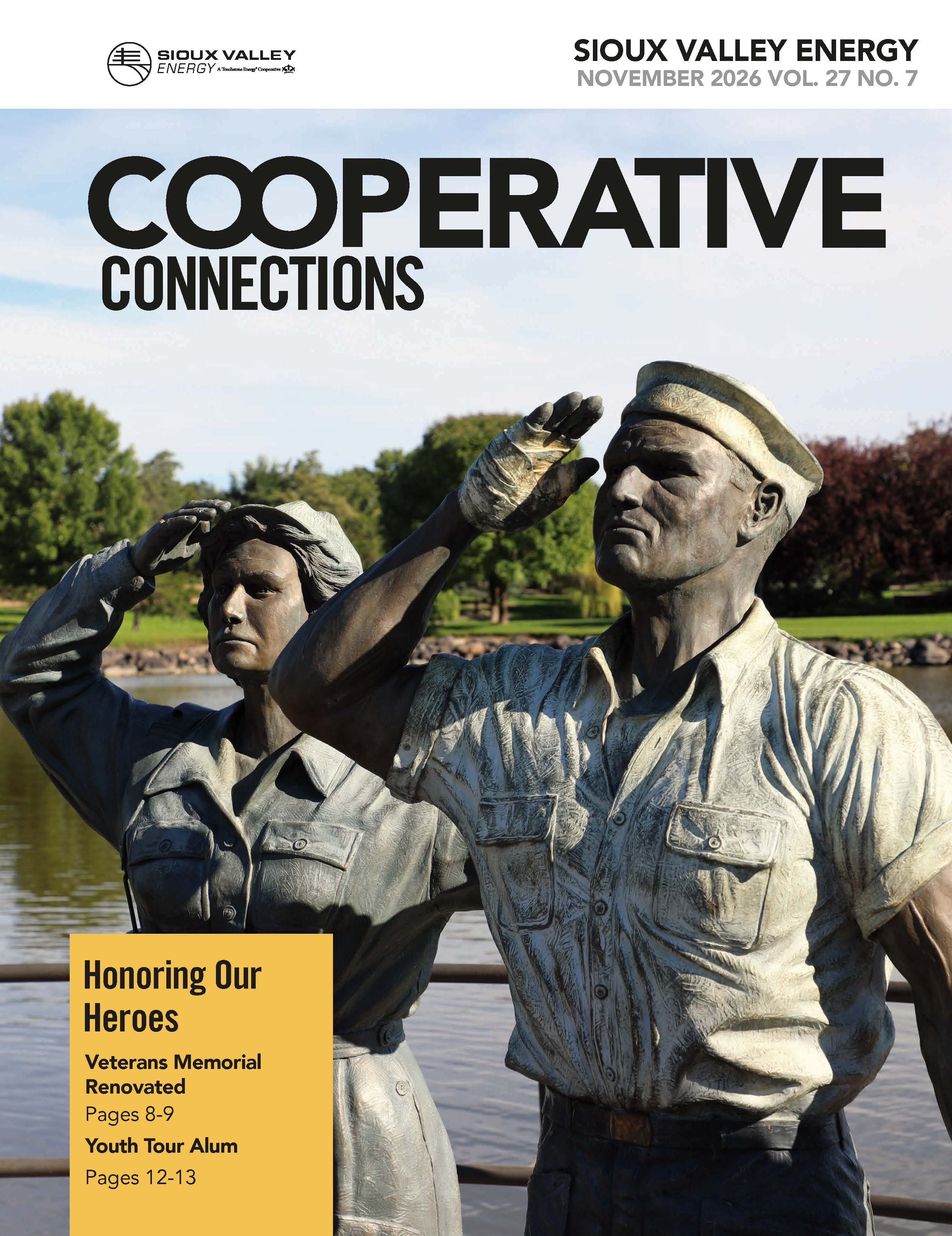 Magazine cover featuring two veteran statues saluting