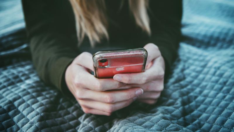 woman on red phone